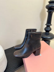 MIUMIU 25S ANKLE BOOTS 65MM IN BLACK BROWN CALFSKIN