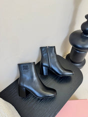 MIUMIU 25S ANKLE BOOTS 65MM IN BLACK CALFSKIN