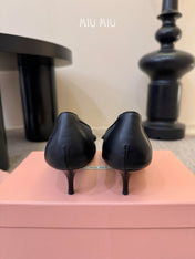 MIUMIU 26S HIGH-HEEL IN BLACK MESH AND LAMBSKIN WITH BOW