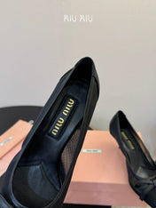 MIUMIU 26S HIGH-HEEL IN BLACK MESH AND LAMBSKIN WITH BOW