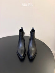 MIUMIU 26S WESTERN ANKLE BOOTS IN BLACK CALFSKIN