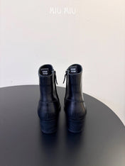 MIUMIU 26S WESTERN ANKLE BOOTS IN BLACK CALFSKIN