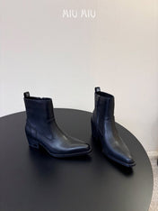 MIUMIU 26S WESTERN ANKLE BOOTS IN BLACK CALFSKIN