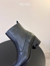 MIUMIU 26S WESTERN ANKLE BOOTS IN BLACK CALFSKIN