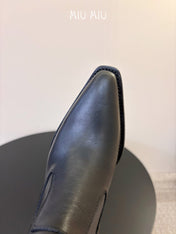 MIUMIU 26S WESTERN ANKLE BOOTS IN BLACK CALFSKIN