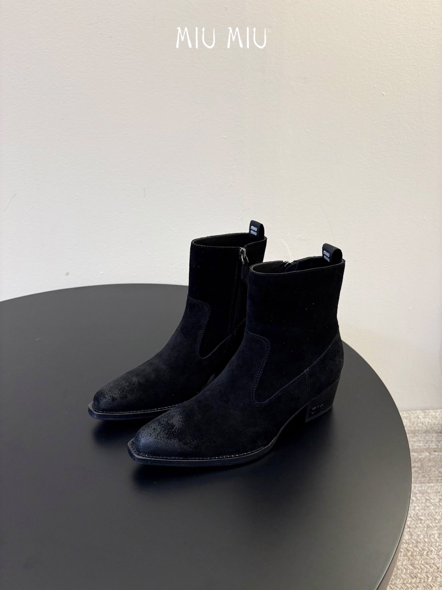 MIUMIU 26S WESTERN ANKLE BOOTS IN BLACK SUEDE