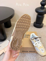 MIUMIU 26S PERFORATED SNEAKERS IN WHITE AND BEIGE YELLOW CALFSKIN