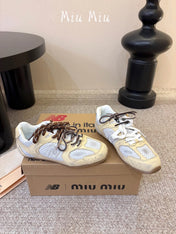 MIUMIU 26S PERFORATED SNEAKERS IN WHITE AND BEIGE YELLOW CALFSKIN