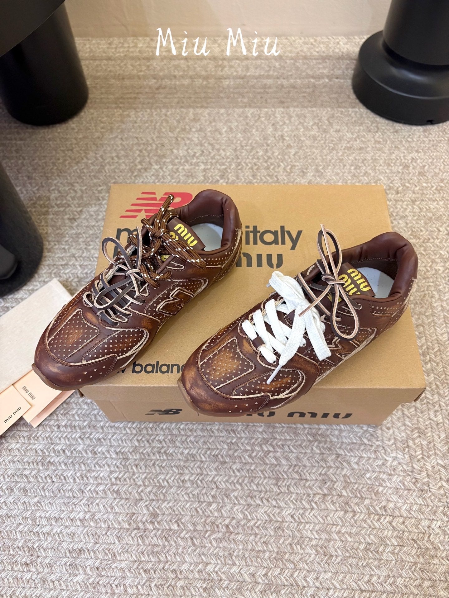 MIUMIU 26S PERFORATED SNEAKERS IN DARK BROWN CALFSKIN