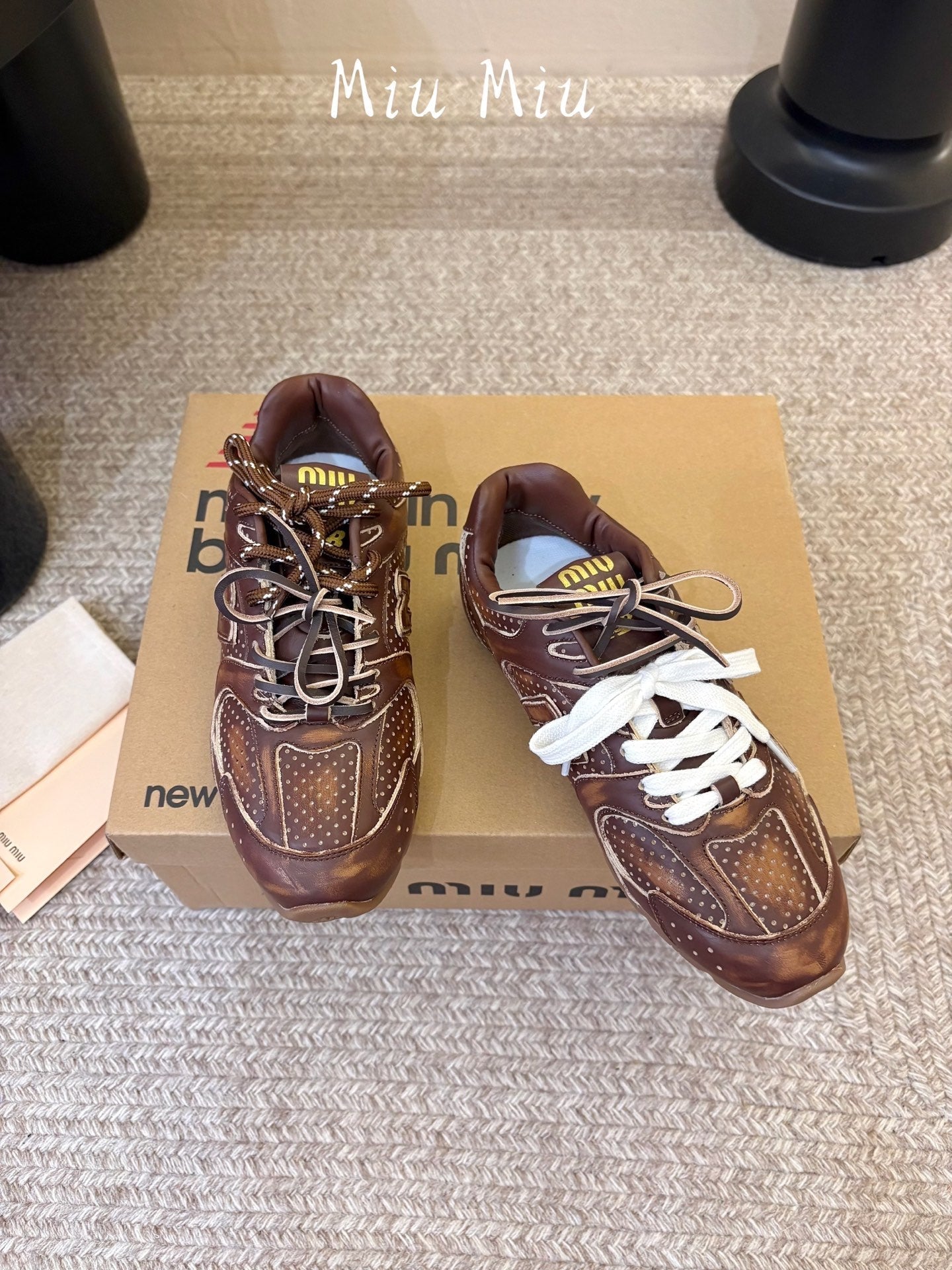 MIUMIU 26S PERFORATED SNEAKERS IN DARK BROWN CALFSKIN