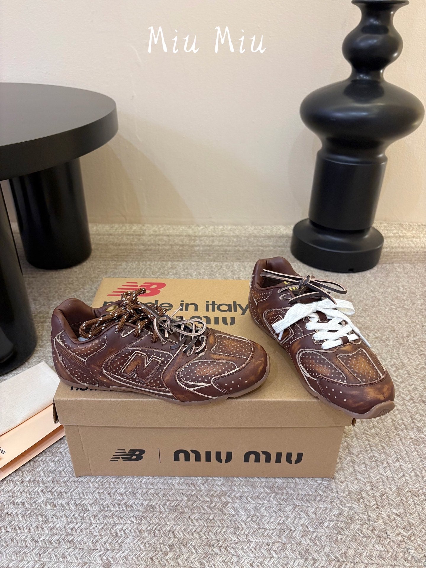 MIUMIU 26S PERFORATED SNEAKERS IN DARK BROWN CALFSKIN