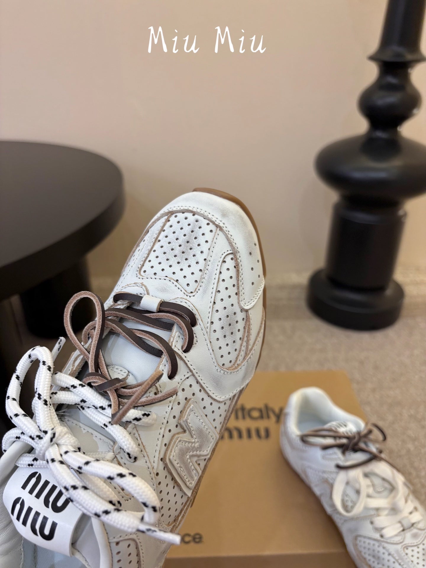 MIUMIU 26S PERFORATED SNEAKERS IN CREAM WHITE CALFSKIN