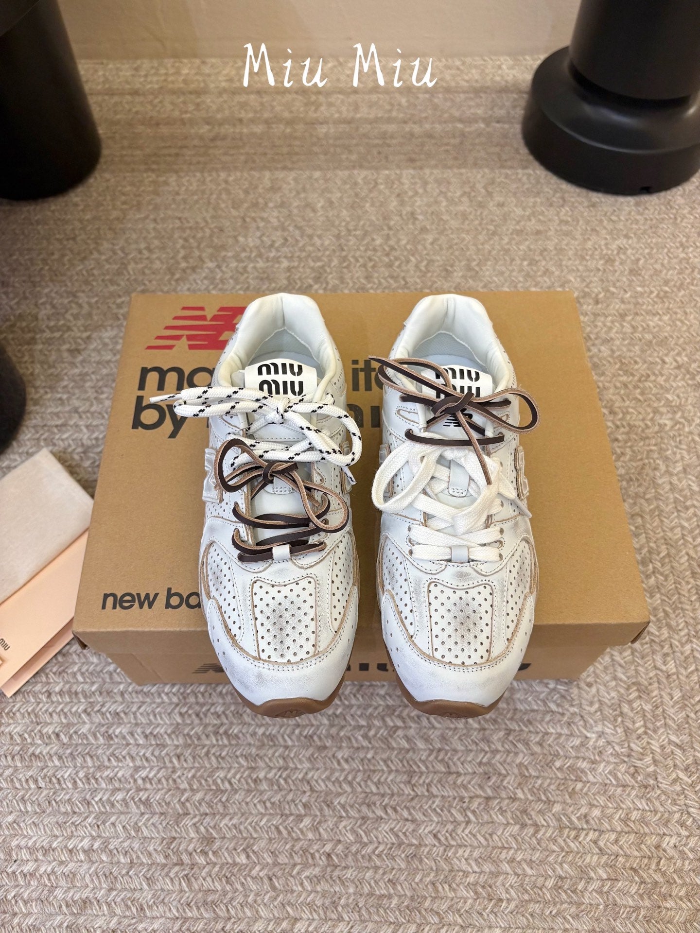 MIUMIU 26S PERFORATED SNEAKERS IN CREAM WHITE CALFSKIN