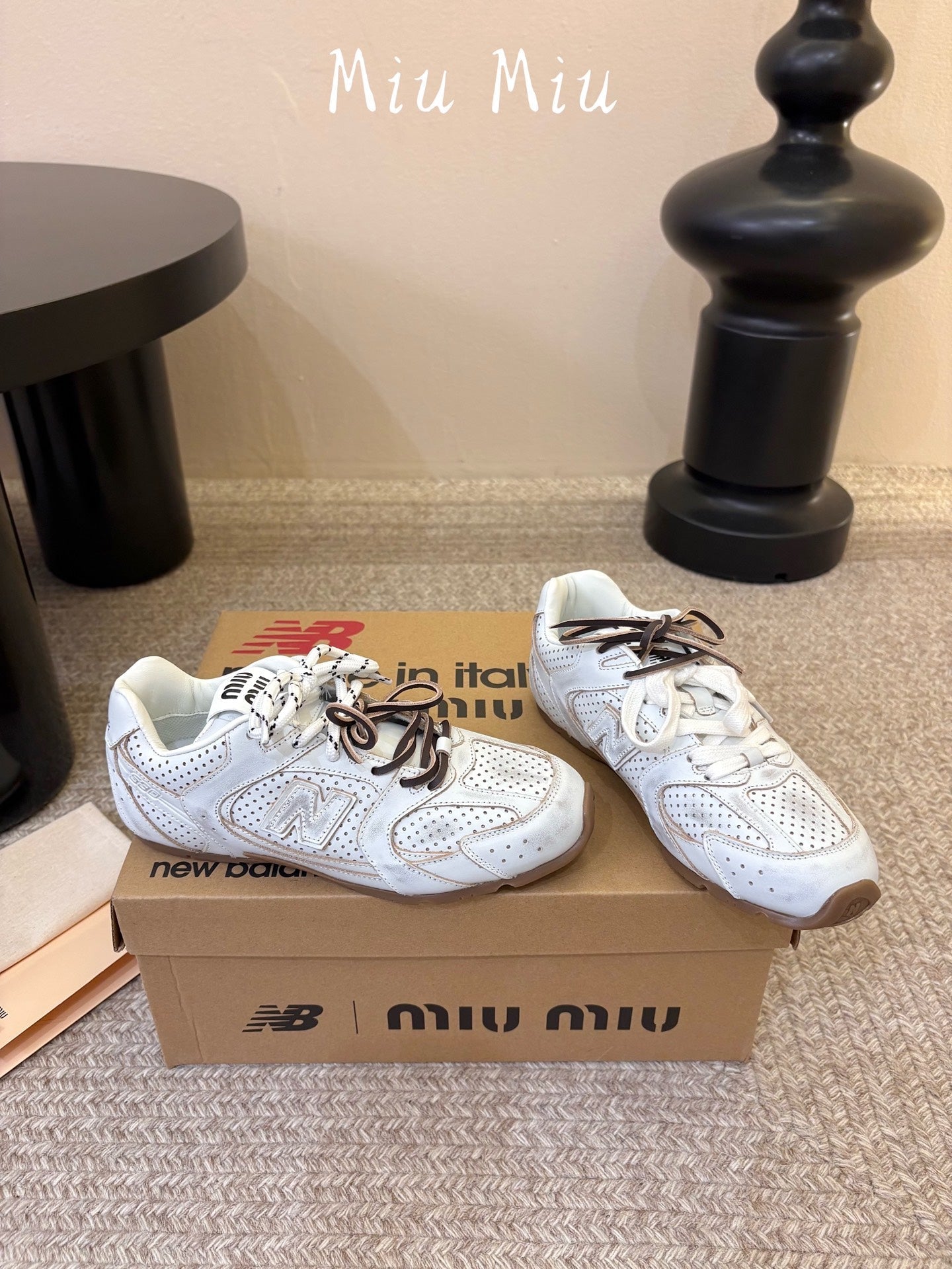 MIUMIU 26S PERFORATED SNEAKERS IN CREAM WHITE CALFSKIN