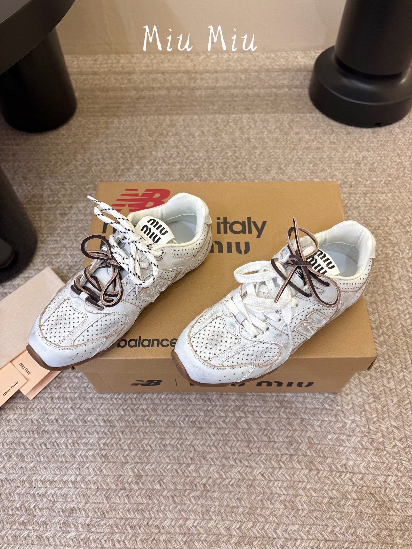 MIUMIU 26S PERFORATED SNEAKERS IN CREAM WHITE CALFSKIN