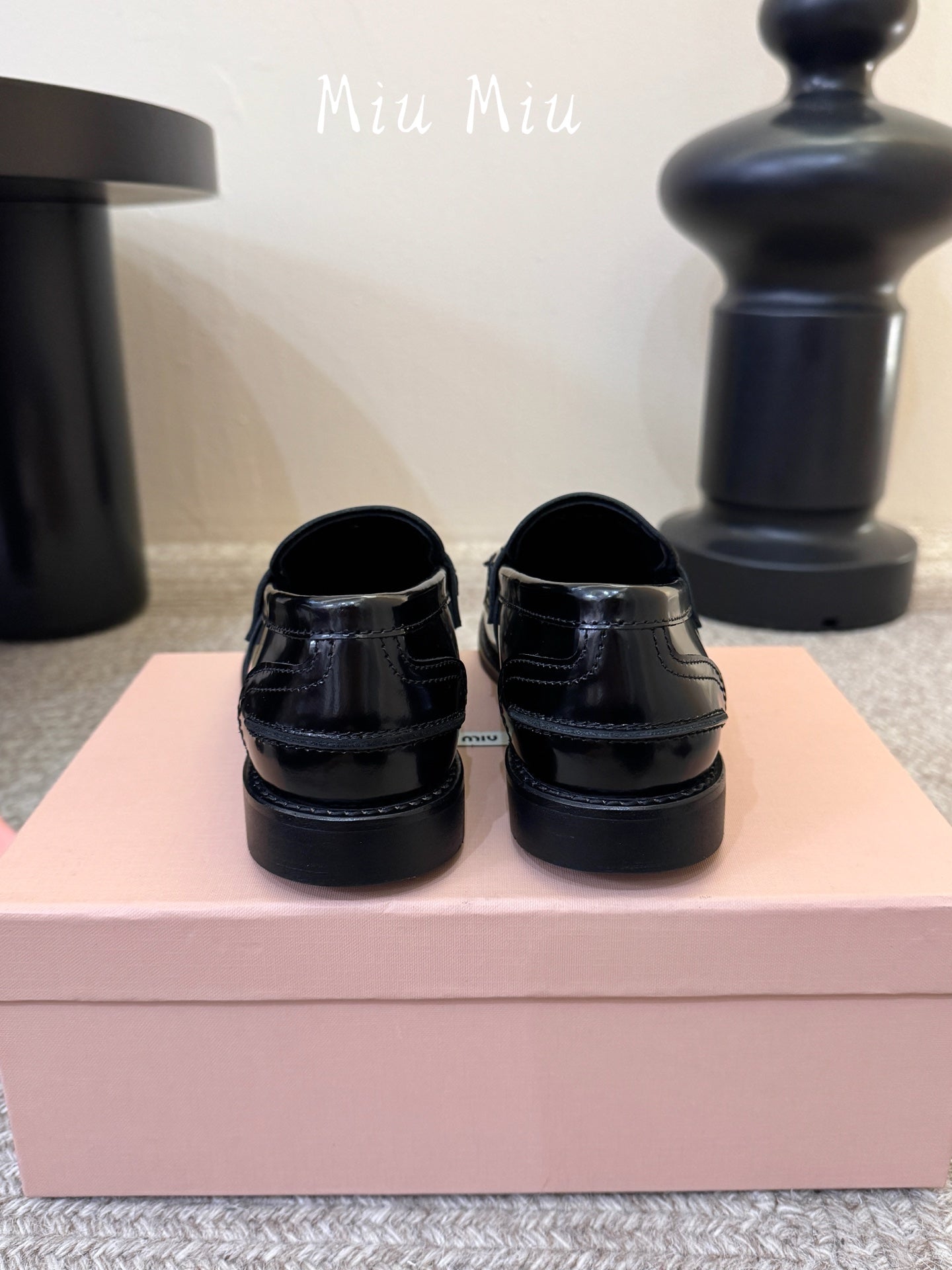MIUMIU 26S FRINGE PENNY LOAFERS IN BLACK CALFSKIN