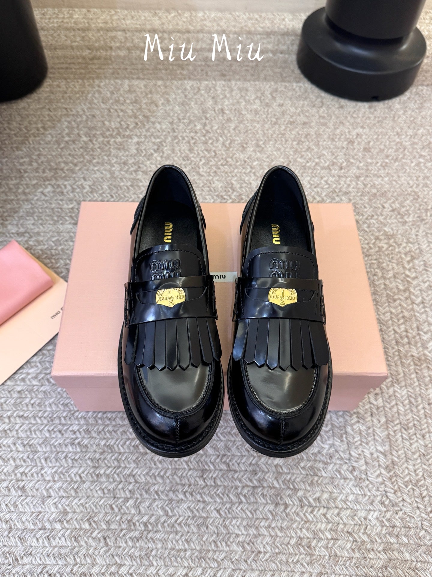 MIUMIU 26S FRINGE PENNY LOAFERS IN BLACK CALFSKIN