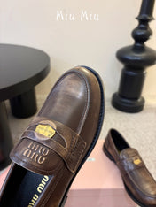 MIUMIU 26S COIN PENNY LOAFERS IN DARK BROWN CALFSKIN