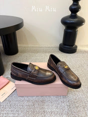 MIUMIU 26S COIN PENNY LOAFERS IN DARK BROWN CALFSKIN