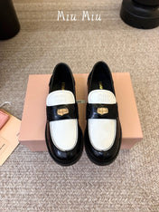 MIUMIU 26S COIN PENNY LOAFERS IN BLACK MIX WHITE CALFSKIN