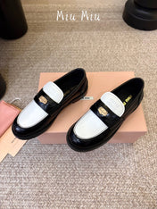 MIUMIU 26S COIN PENNY LOAFERS IN BLACK MIX WHITE CALFSKIN