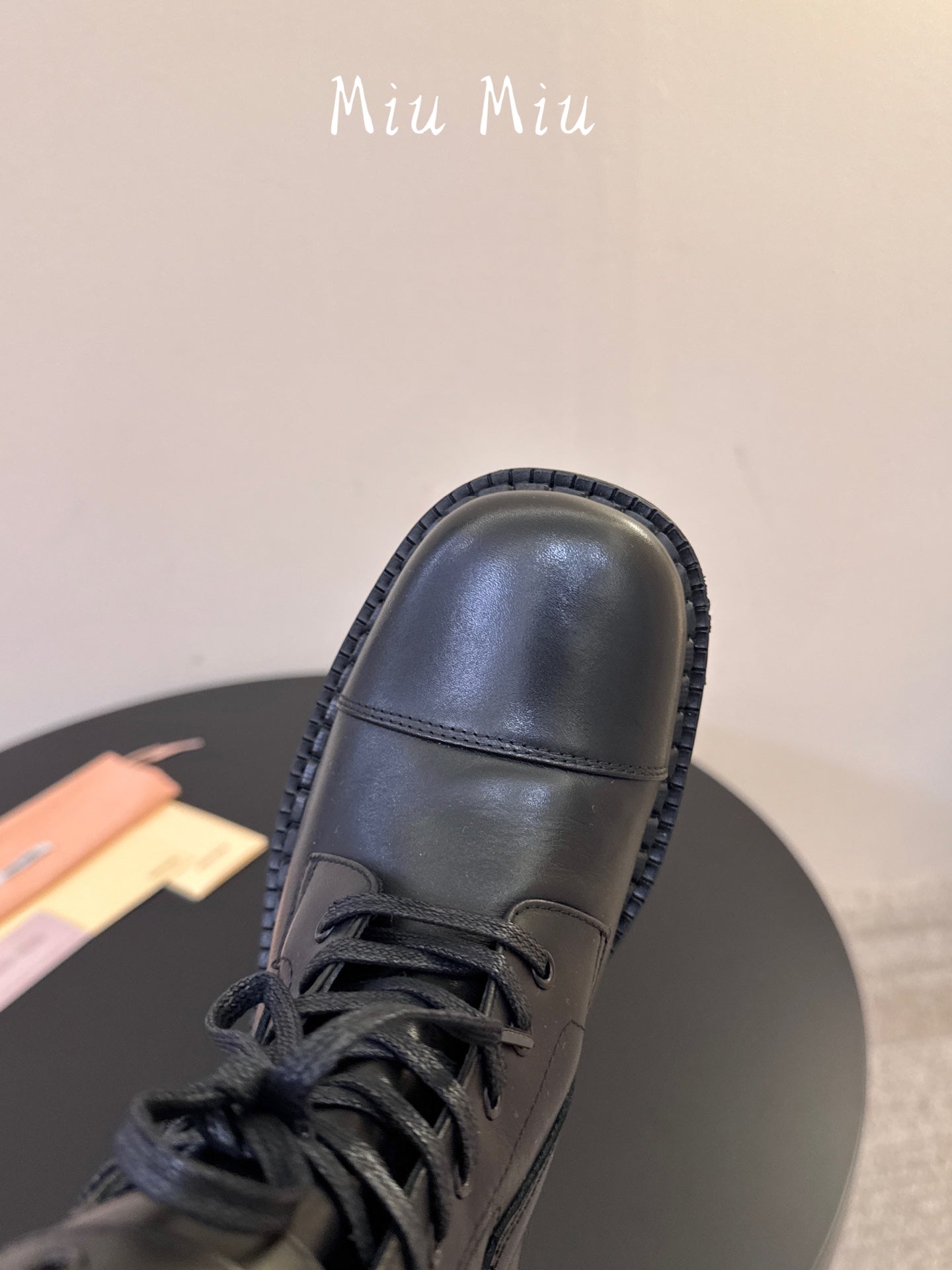 MIUMIU 26S LACE-UP ANKLE BOOTS IN BLACK CALFSKIN