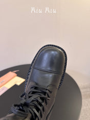 MIUMIU 26S LACE-UP ANKLE BOOTS IN BLACK CALFSKIN