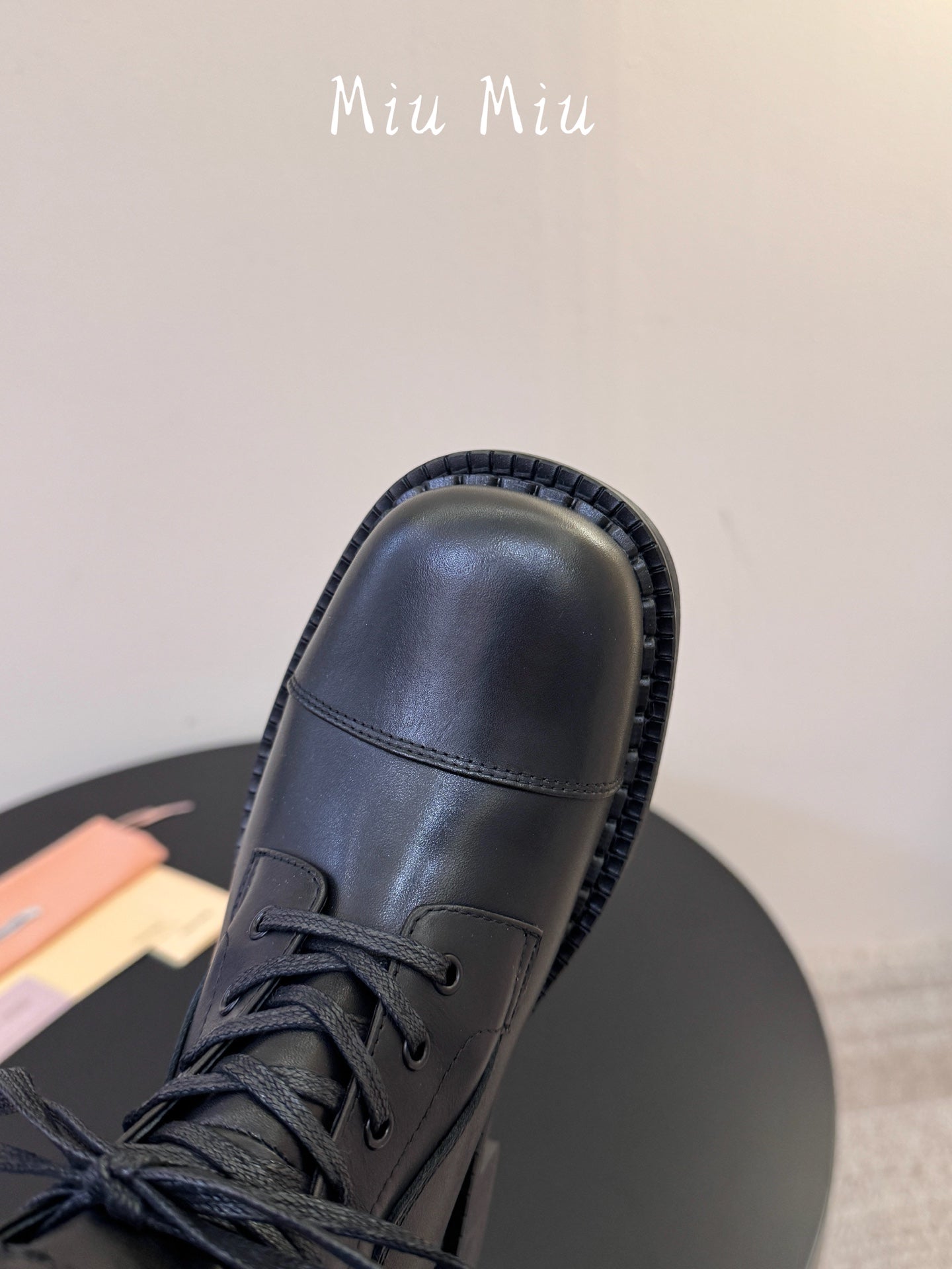 MIUMIU 26S LACE-UP ANKLE BOOTS IN BLACK CALFSKIN