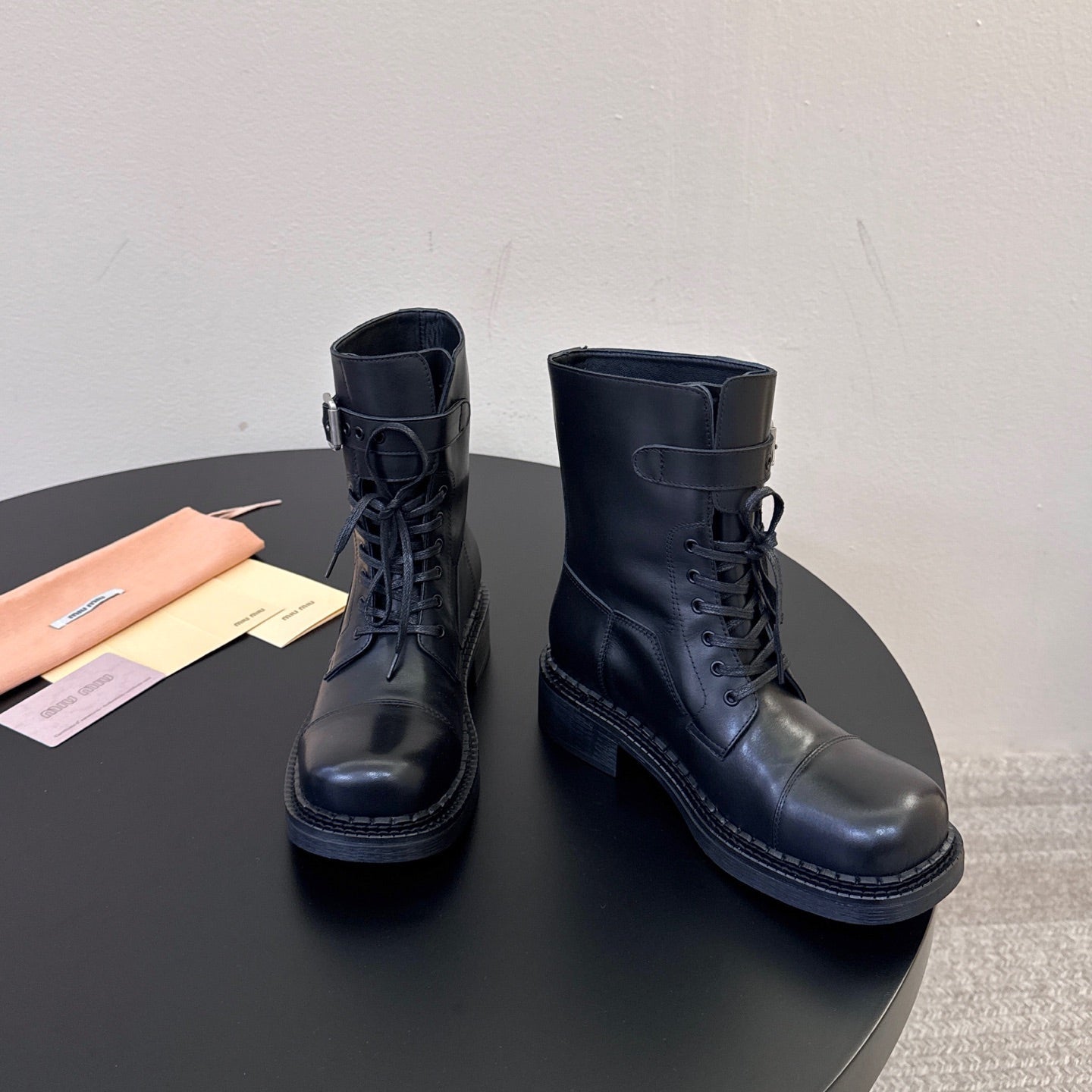 MIUMIU 26S LACE-UP ANKLE BOOTS IN BLACK CALFSKIN
