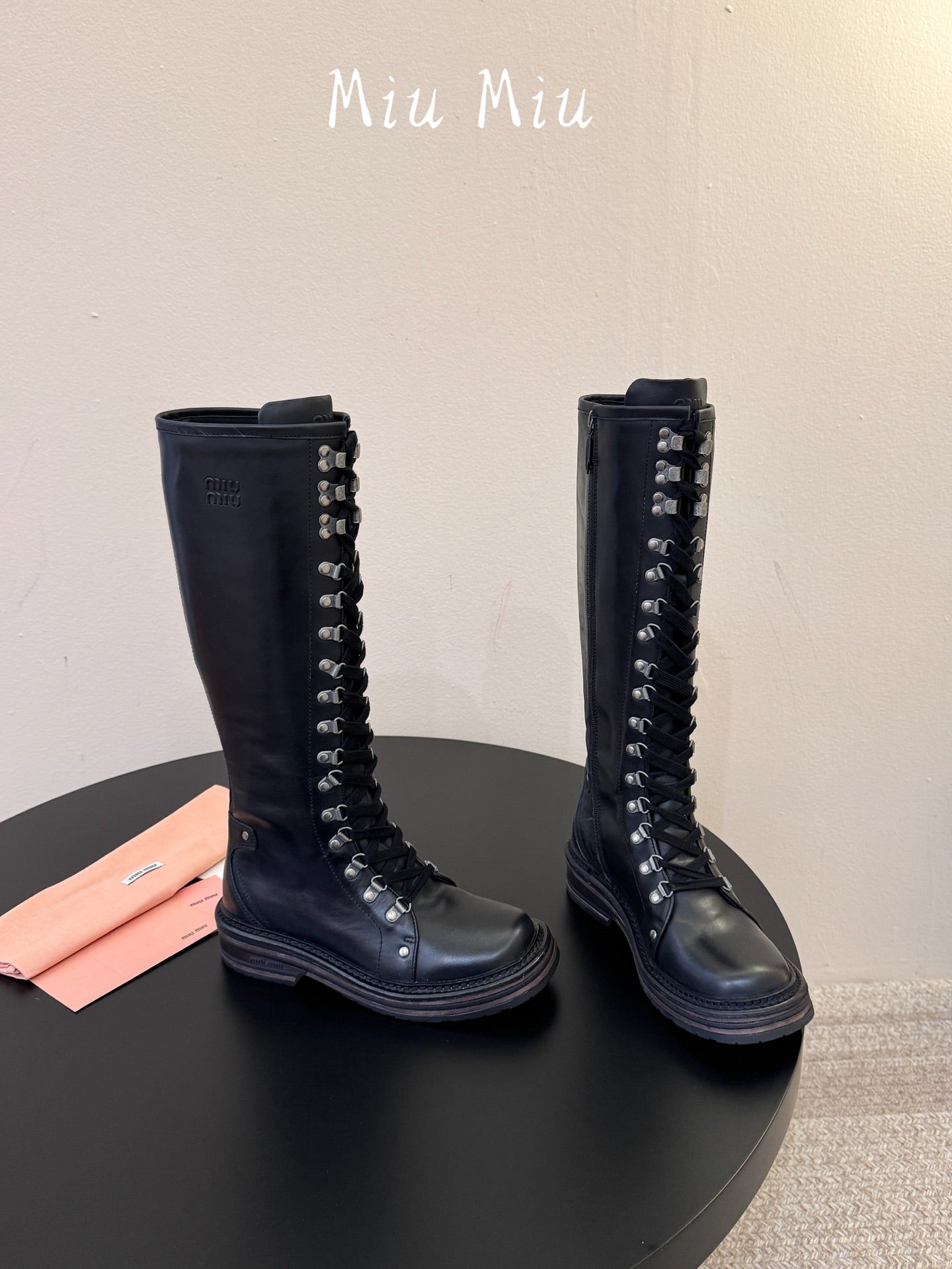 MIUMIU 26S HIGH HIKING BOOTS IN BLACK CALFSKIN