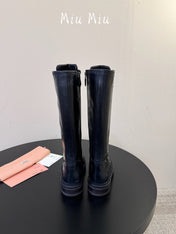 MIUMIU 26S HIGH HIKING BOOTS IN BLACK CALFSKIN