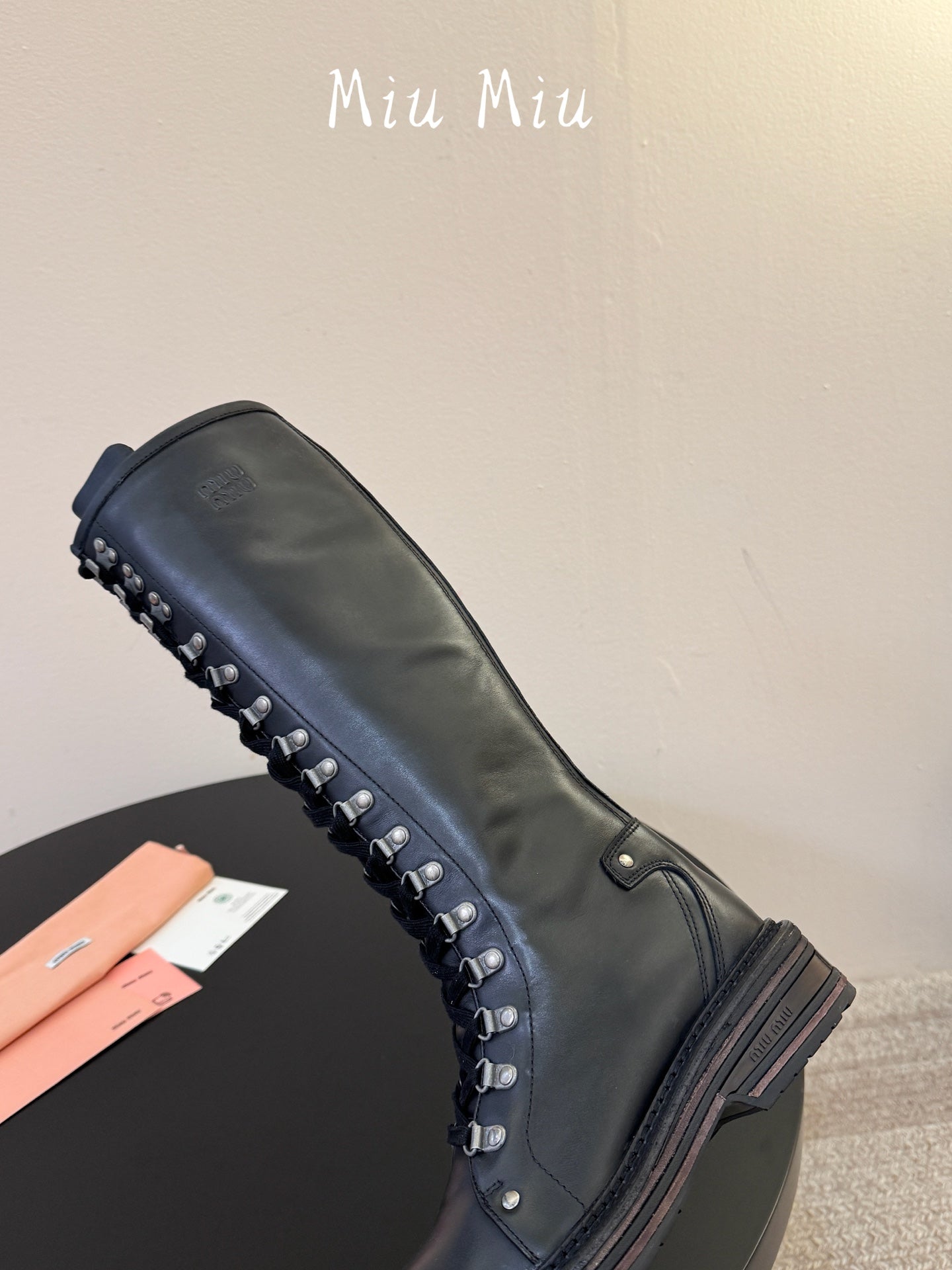 MIUMIU 26S HIGH HIKING BOOTS IN BLACK CALFSKIN