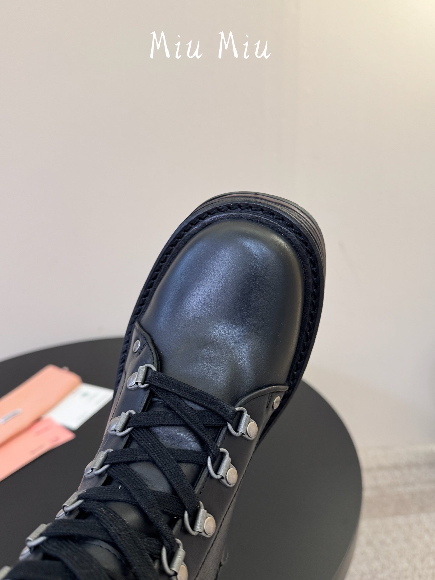 MIUMIU 26S HIGH HIKING BOOTS IN BLACK CALFSKIN