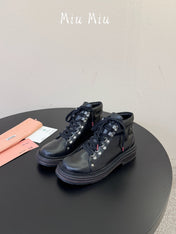 MIUMIU 26S ANKLE MOUNTAIN BOOTS IN BLACK CALFSKIN