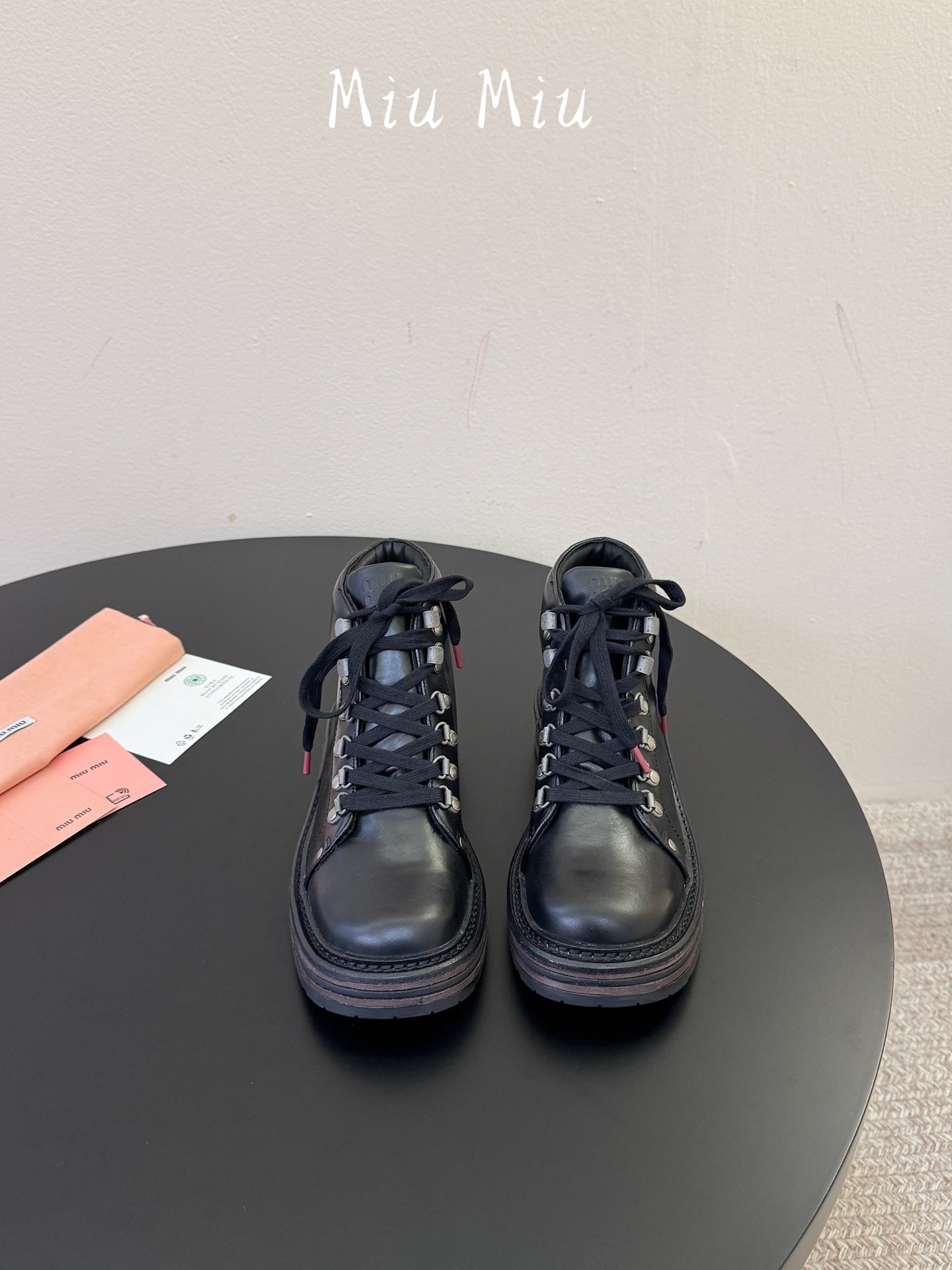 MIUMIU 26S ANKLE MOUNTAIN BOOTS IN BLACK CALFSKIN