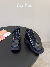 MIUMIU 26S ANKLE MOUNTAIN BOOTS IN BLACK CALFSKIN
