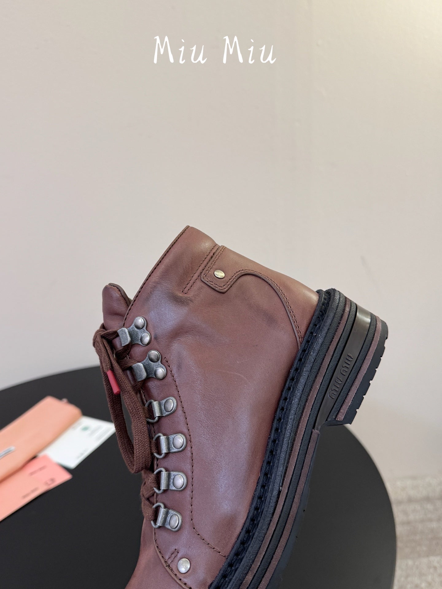 MIUMIU 26S ANKLE MOUNTAIN BOOTS IN DARK BROWN CALFSKIN