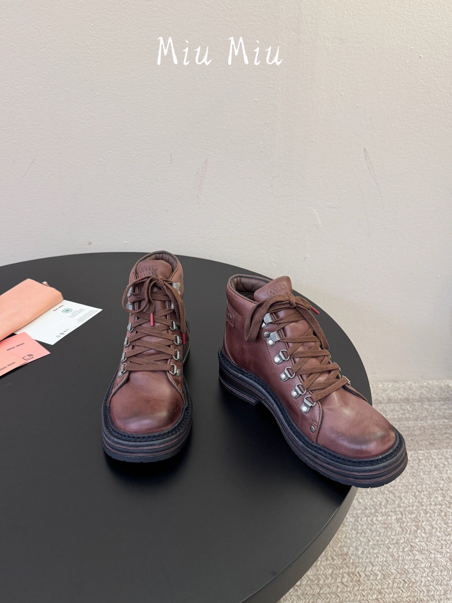 MIUMIU 26S ANKLE MOUNTAIN BOOTS IN DARK BROWN CALFSKIN