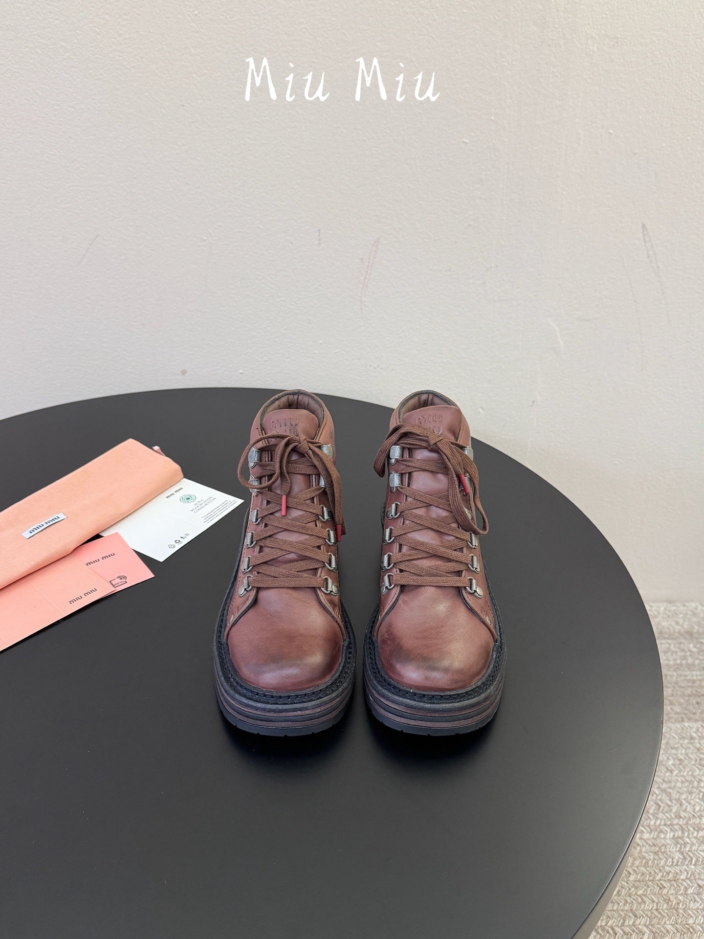 MIUMIU 26S ANKLE MOUNTAIN BOOTS IN DARK BROWN CALFSKIN