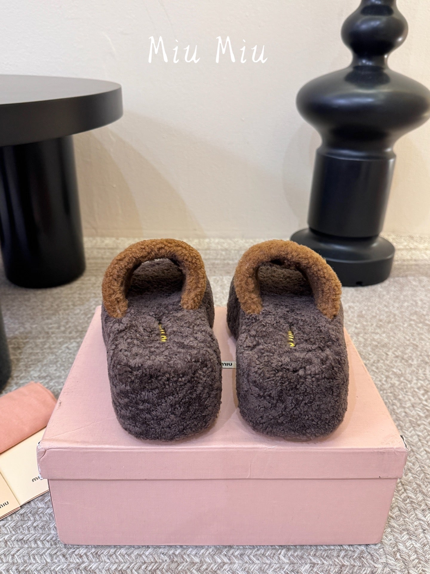 MIUMIU 26S PLATFORM SLIDES IN DARK BROWN SHEARLING