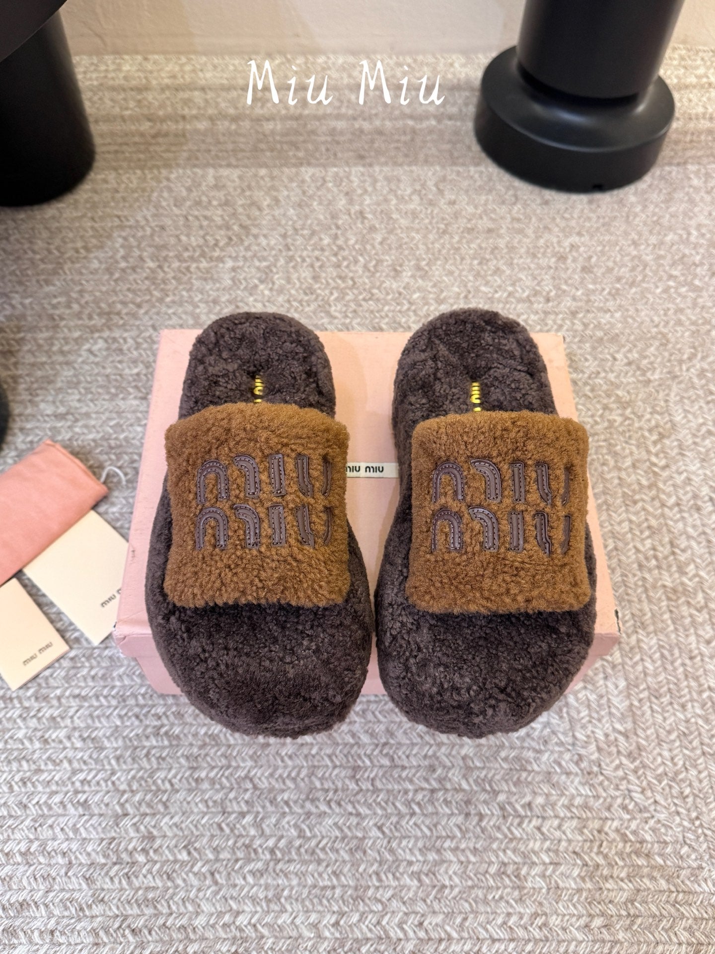 MIUMIU 26S PLATFORM SLIDES IN DARK BROWN SHEARLING