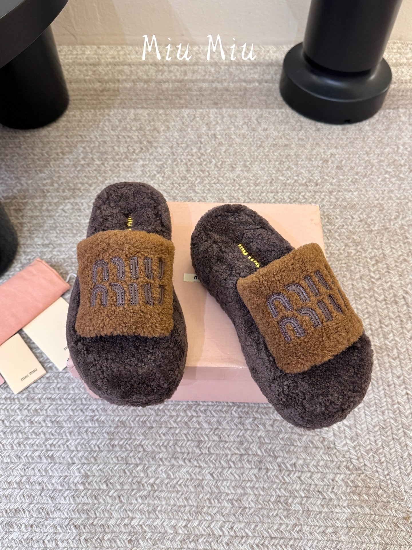 MIUMIU 26S PLATFORM SLIDES IN DARK BROWN SHEARLING