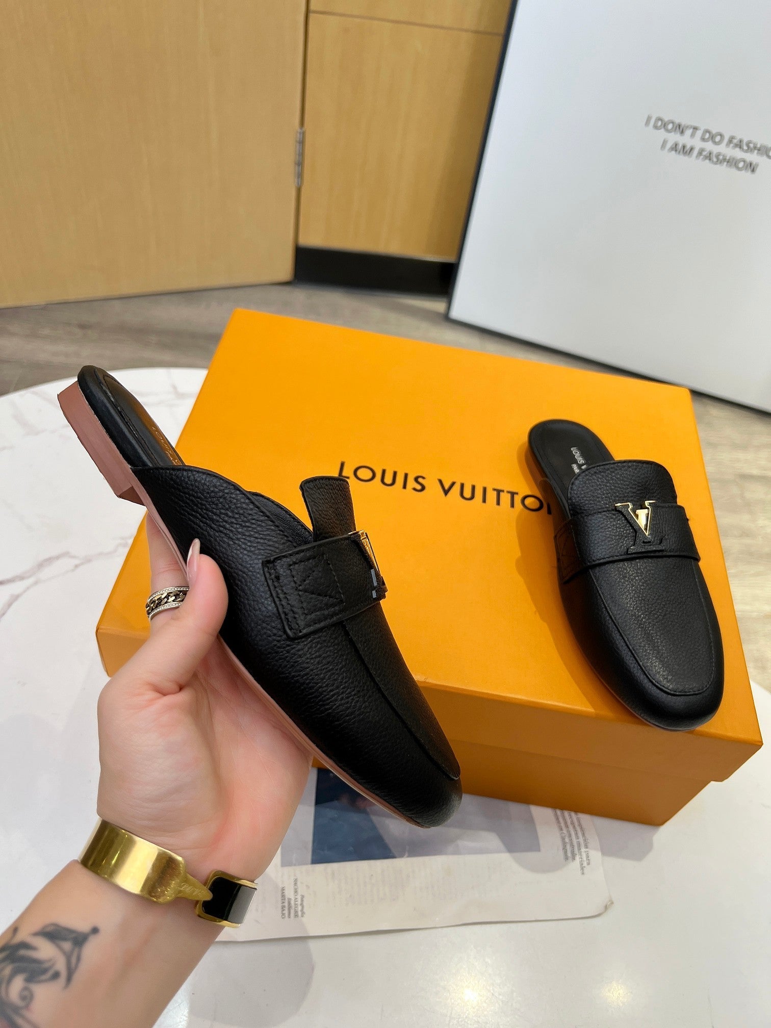 LV 26S MARE OPEN-BACK LOAFERS IN BLACK GRAINED CALFSKIN