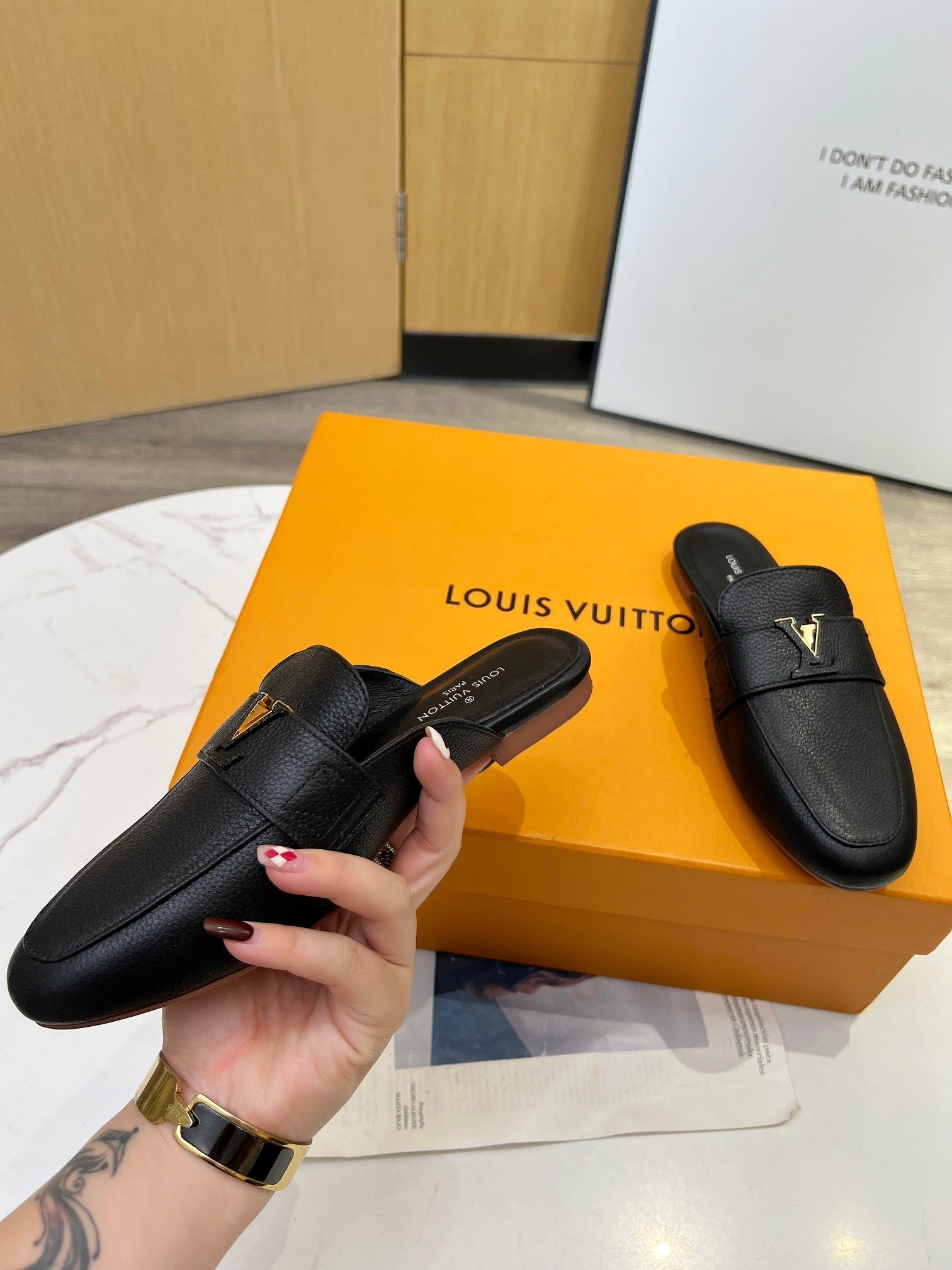 LV 26S MARE OPEN-BACK LOAFERS IN BLACK GRAINED CALFSKIN