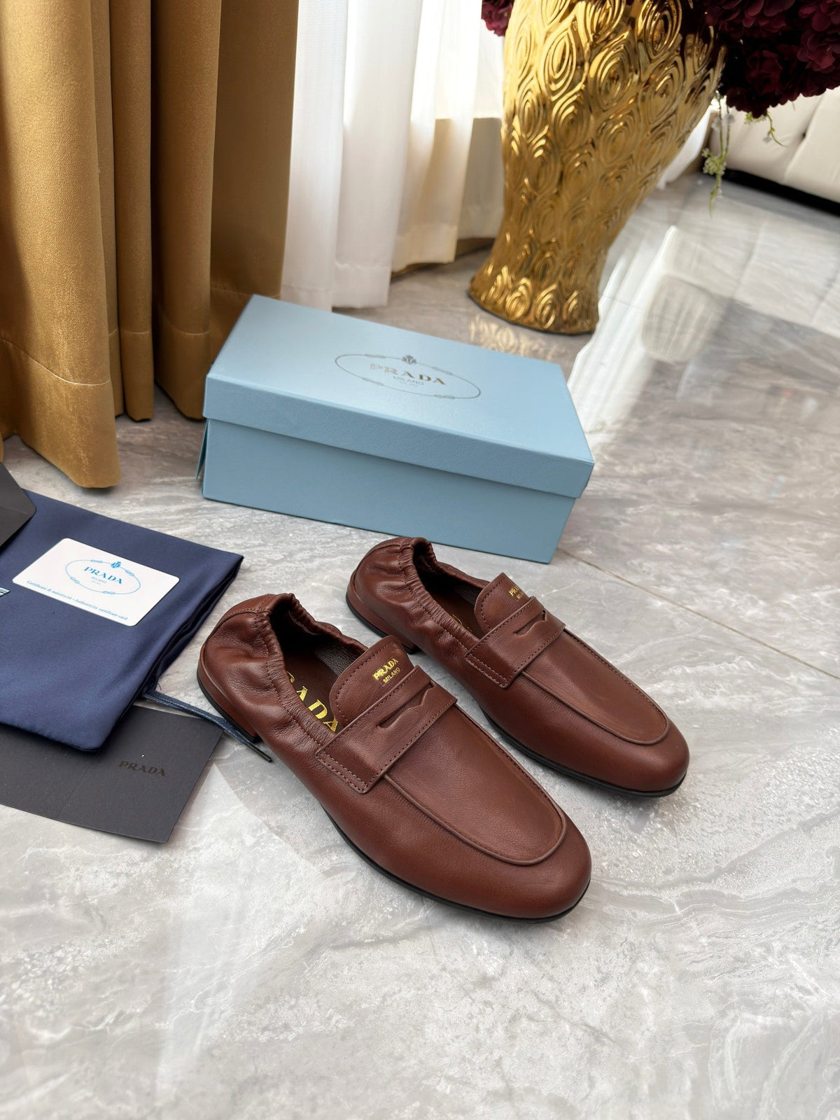 PRADA 25S LOAFERS IN BROWN CALFSKIN