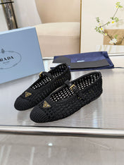 PRADA 26S MARY JANE FLATS IN BLACK WOVEN RAFFIA WITH TRIANGLE LOGO