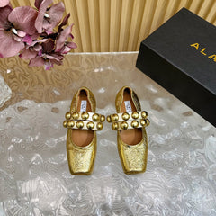ALAIA MARY JANE PEARL IN GOLD GLOSSY LAMBSKIN