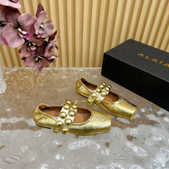 ALAIA MARY JANE PEARL IN GOLD GLOSSY LAMBSKIN