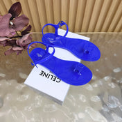 CELINE 26S TRIOMPHE JELLY THONG SANDALS IN DARK BLUE TPU GOLD HARDWARE