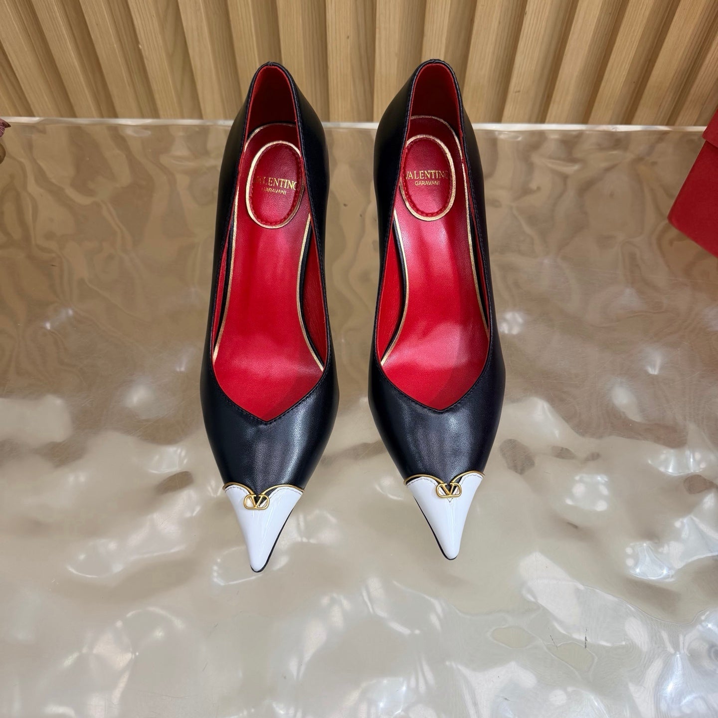VALENTINO 26S CAP-TOE PUMPS 90 MM IN WHITE AND BLACK CALFSKIN